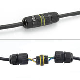 Black cable connectors with yellow accents on a white background